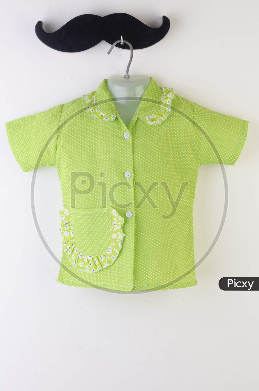 Kids Night Wear Paijama Over An Isolated White Background