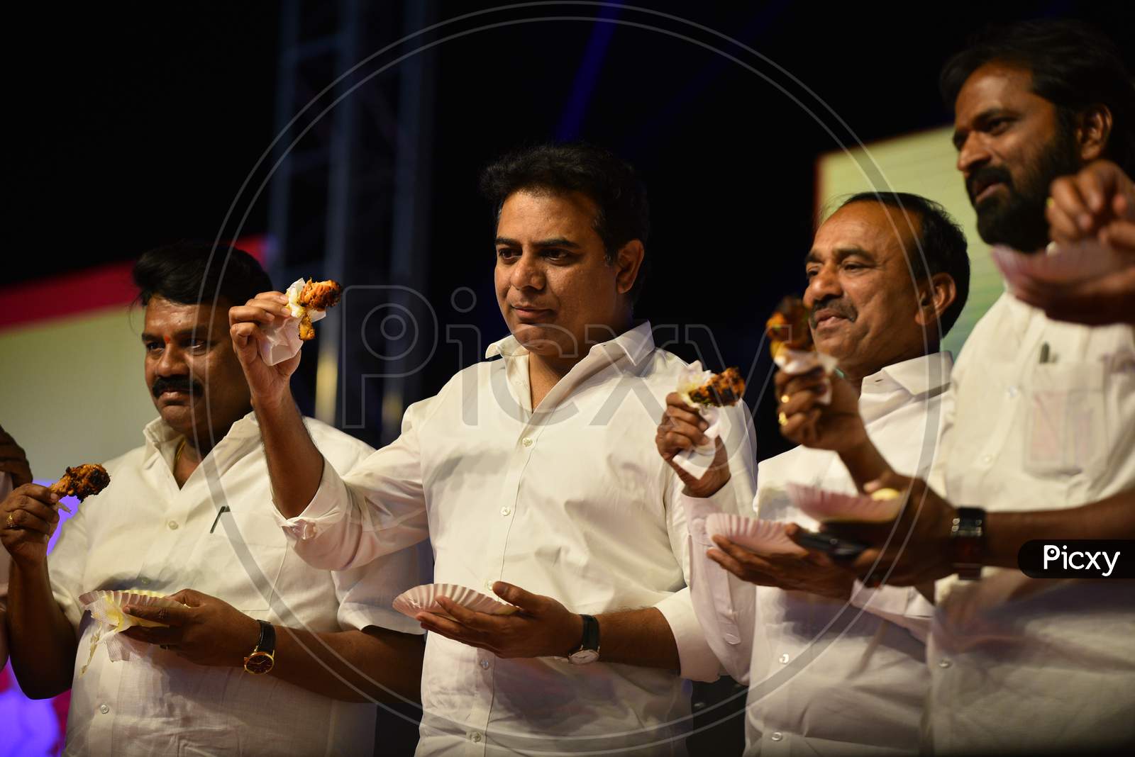 Telangana Cabinet Ministers, KTR, Etela Rajender, V Srinivas Goud and Talasani Srinivas Yadav eating chicken in a Public Meeting