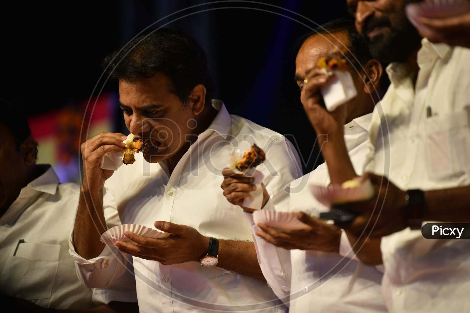 Telangana Cabinet Ministers, KTR, Etela Rajender, V Srinivas Goud eating chicken in a Public Meeting