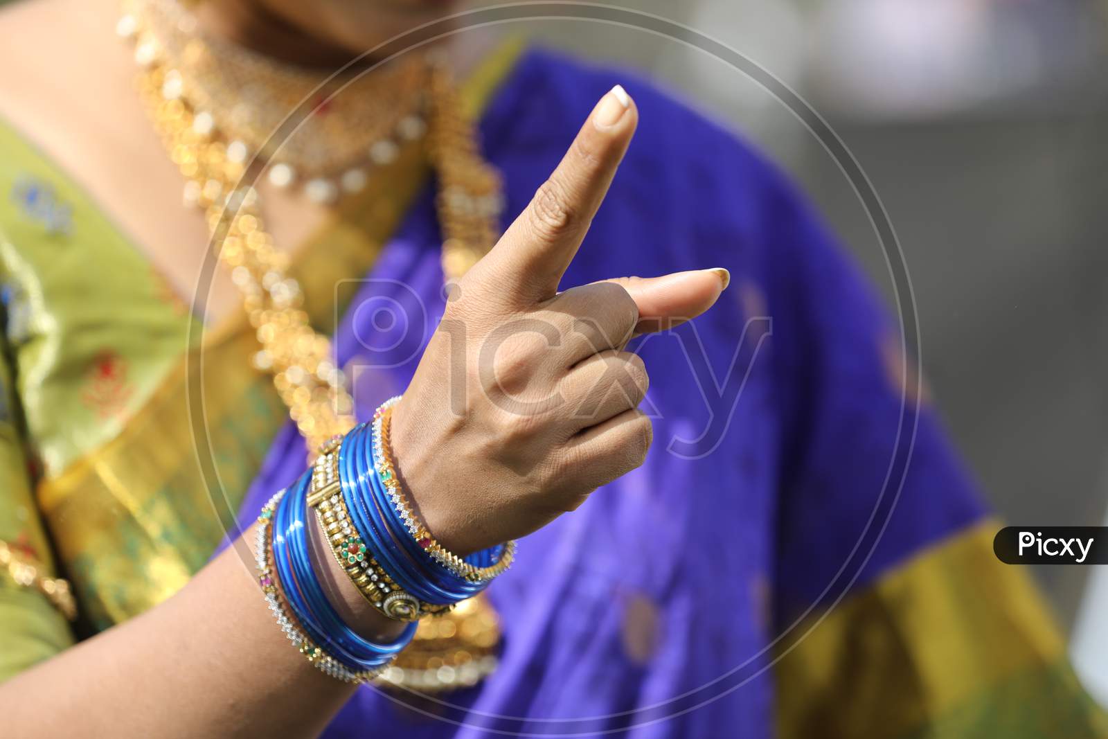 Indian Traditional Woman Giving Warning By Showing Finger Gesture