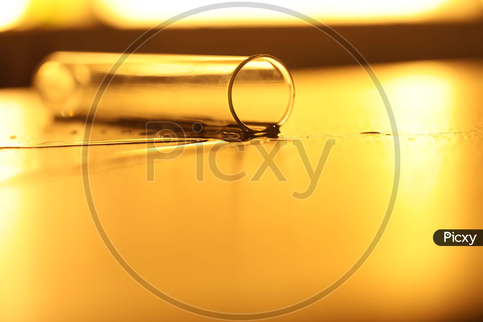 Macro Shot Of a Spilled Water From a Laboratory Test Tube or  Beaker