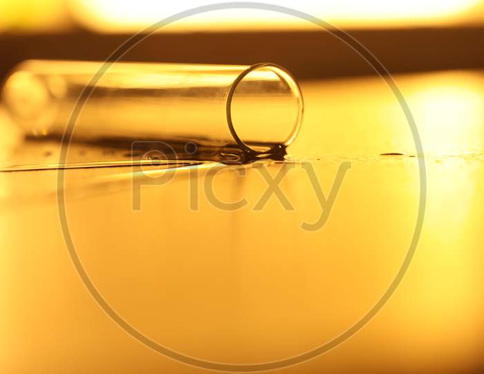 Macro Shot Of a Spilled Water From a Laboratory Test Tube or  Beaker