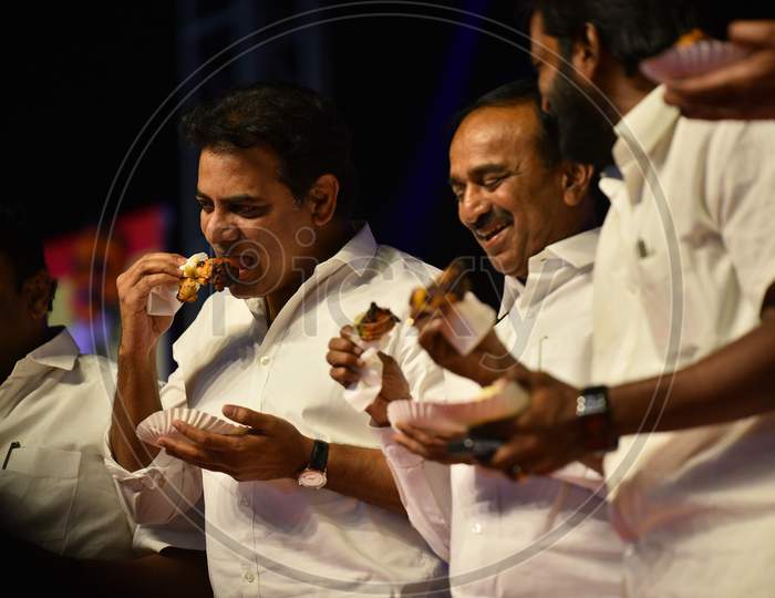Telangana Cabinet Ministers KTR,Etela Rajender, V Srinivas Goud eating chicken in a Public Meeting