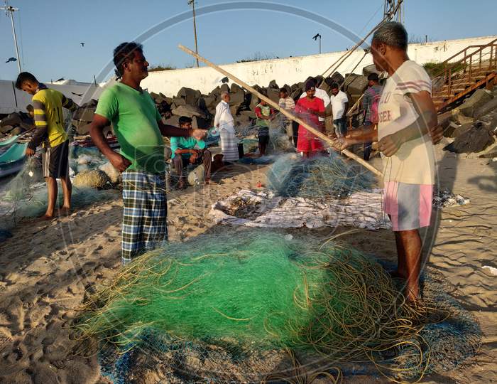 Fisherman With Fishing Nets at Pondicherry Beach