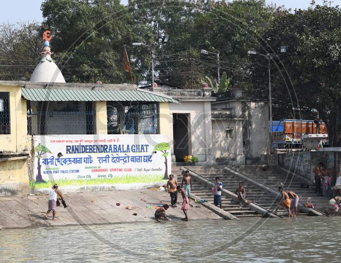 People Bathing on The Bank Of Hooghly River  At Ghats in Kolkata