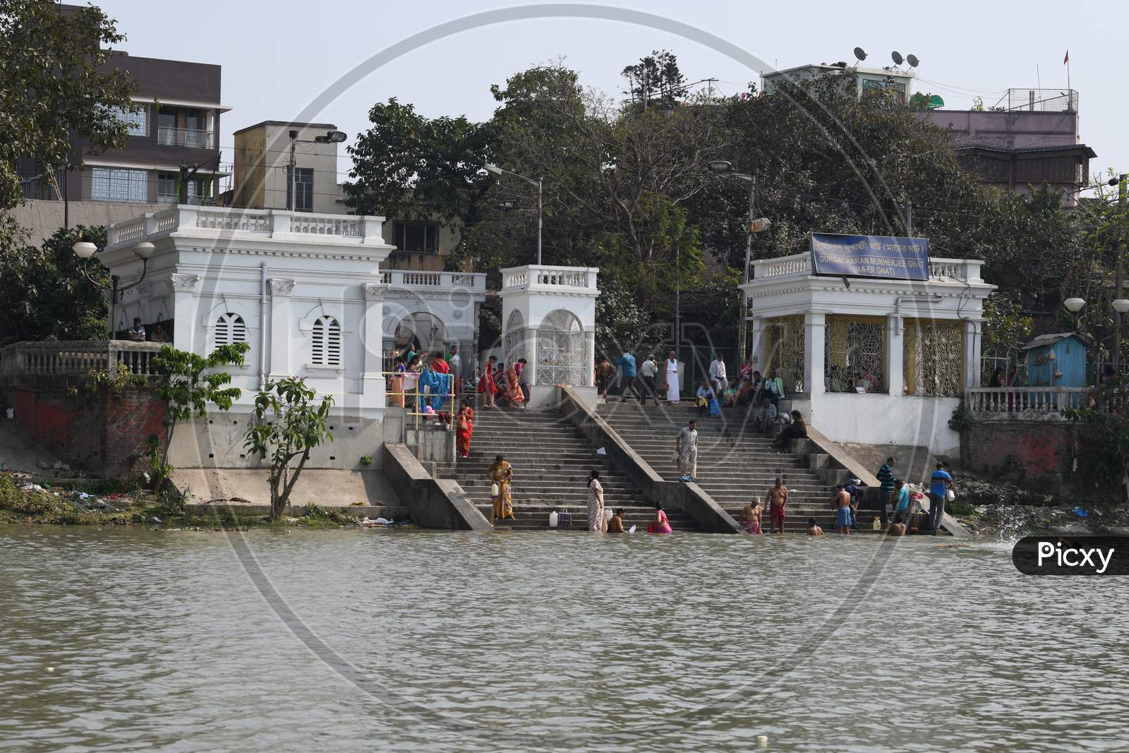 People Bathing On The Bank Of Hooghly River  At  Durga Charan Mukherjee  Ghat In Kolkata