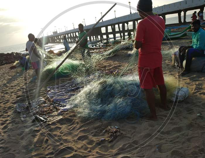 Fisherman With Fishing Nets at Pondicherry Beach