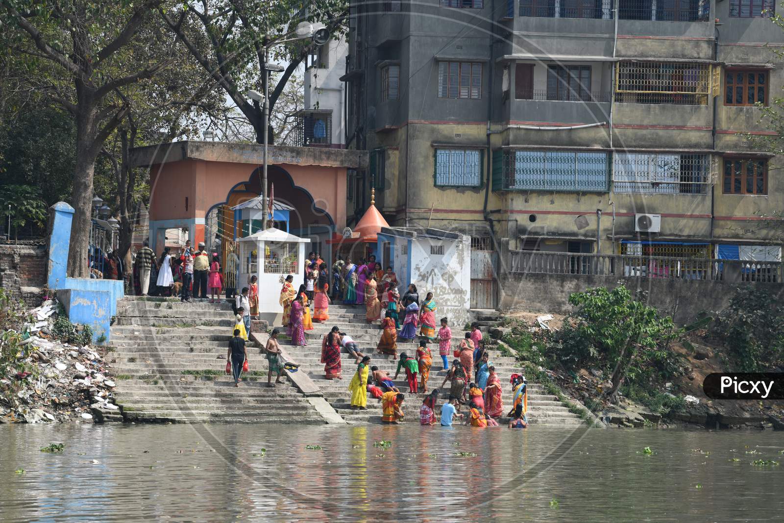 Hindu Devotees Taking Bath  in Hooghly River  at  Ghats Near Dakshineshwar Kali Temple  in Kolkata