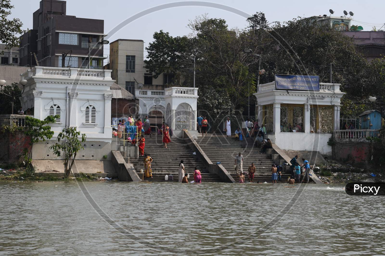 People Bathing On The Bank Of Hooghly River  At  Durga Charan Mukherjee  Ghat In Kolkata