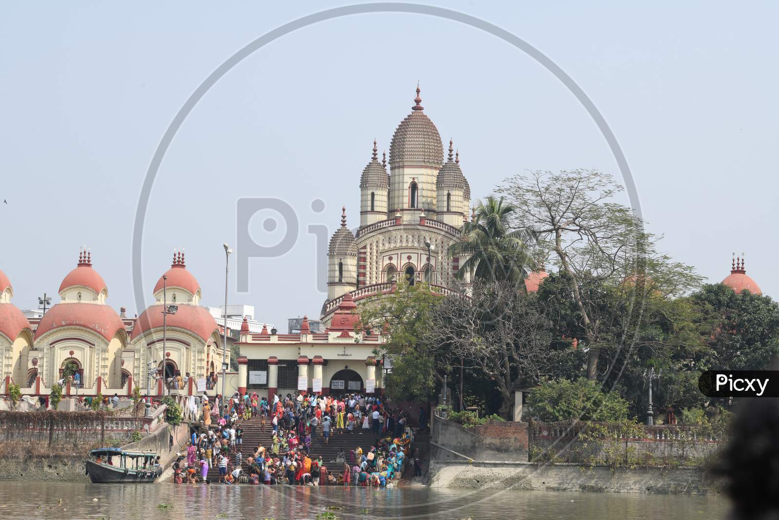 Hindu Devotees Taking Bath  in Hooghly River  at  Ghats Near Dakshineshwar Kali Temple  in Kolkata