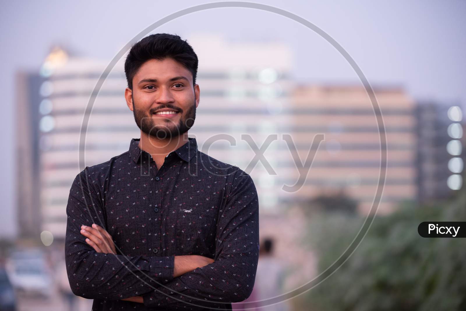 Young Indian Businessman With Smile Face