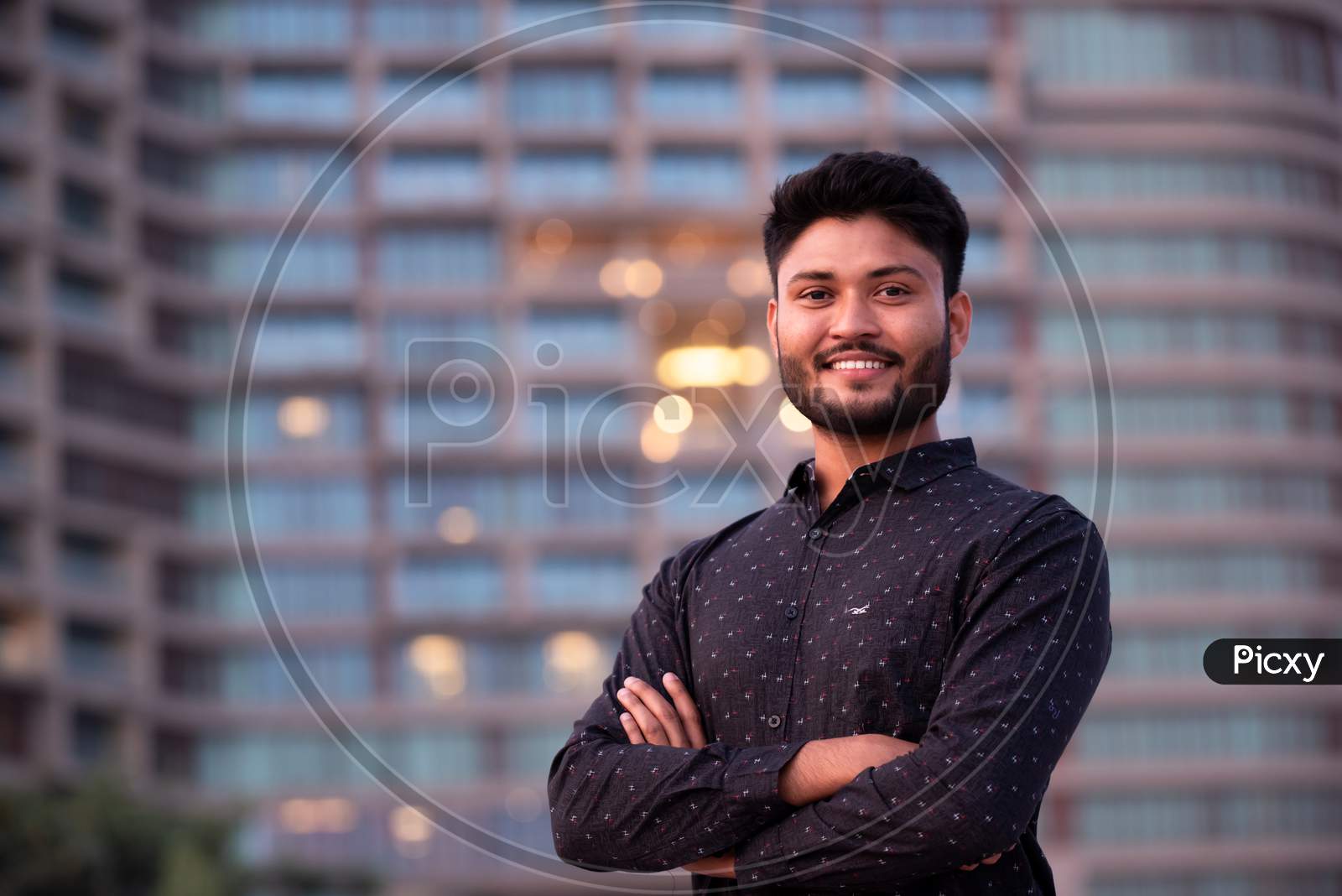 Young Indian Businessman With Smile Face