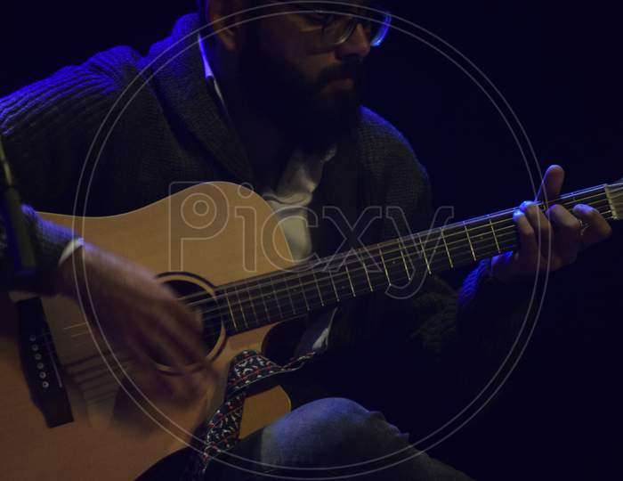 A Guitarist performing live