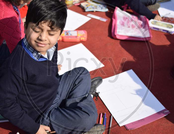 Portrait of a kid during drawing competition in  Shantiniketan World School, Delhi