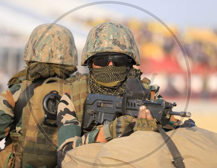 Indian Military  Or Indian Army Soldiers With Combat Ammunition At Defence Expo Event DefExpo 2020 in Lucknow , Uttar Pradesh