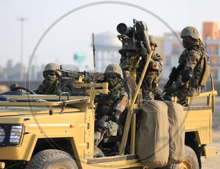 Indian Military  Or Indian Army Soldiers on Military Jeep  With Combat Ammunition At Defence Expo Event DefExpo 2020 in Lucknow , Uttar Pradesh