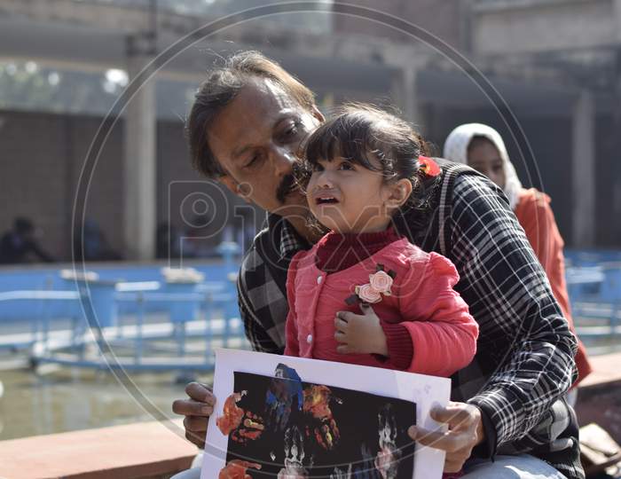Indian Father with her child at Shantiniketan World School, Delhi