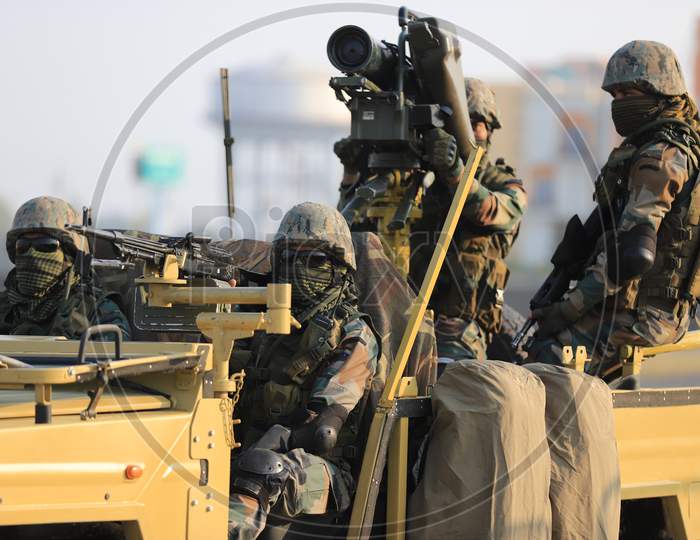 Indian Military  Or Indian Army Soldiers on Military Jeep  With Combat Ammunition At Defence Expo Event DefExpo 2020 in Lucknow , Uttar Pradesh