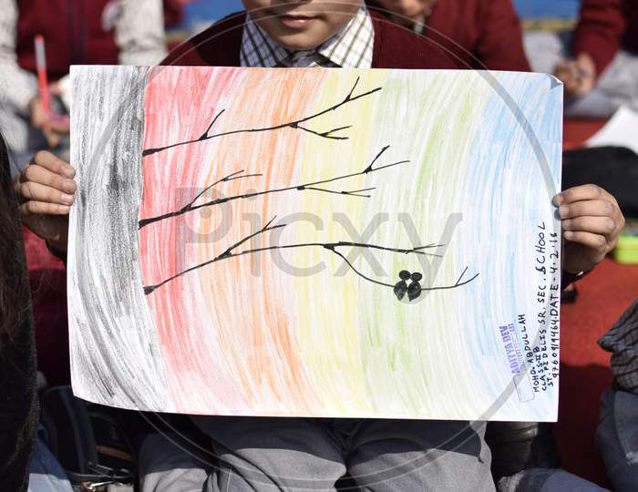 Indian Student showing his sketch