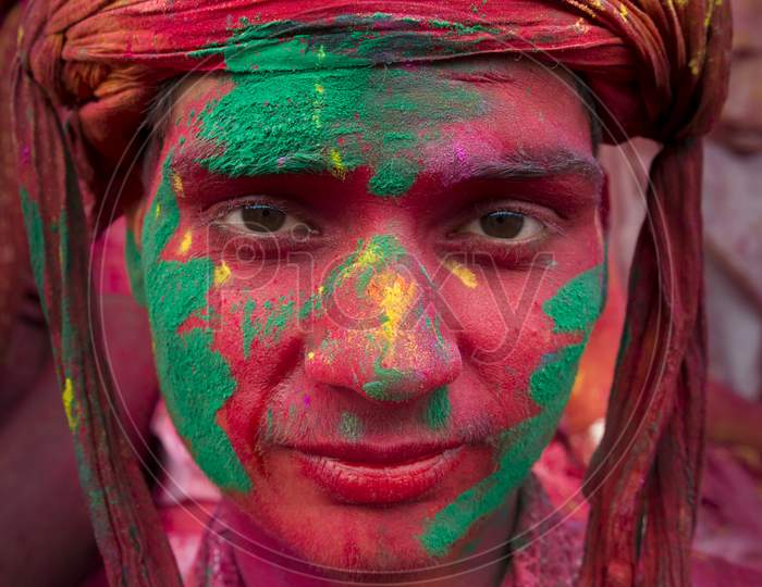 Portrait of a young boy during holi festival in Nandgaon, Uttar Pradesh, India