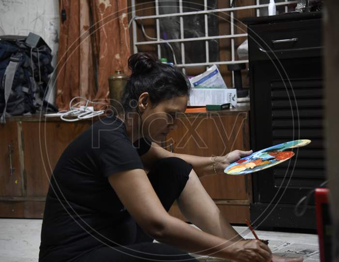 View of Indian Woman painting