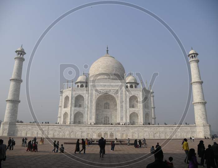 Beautiful View Of Taj Mahal With Visitors