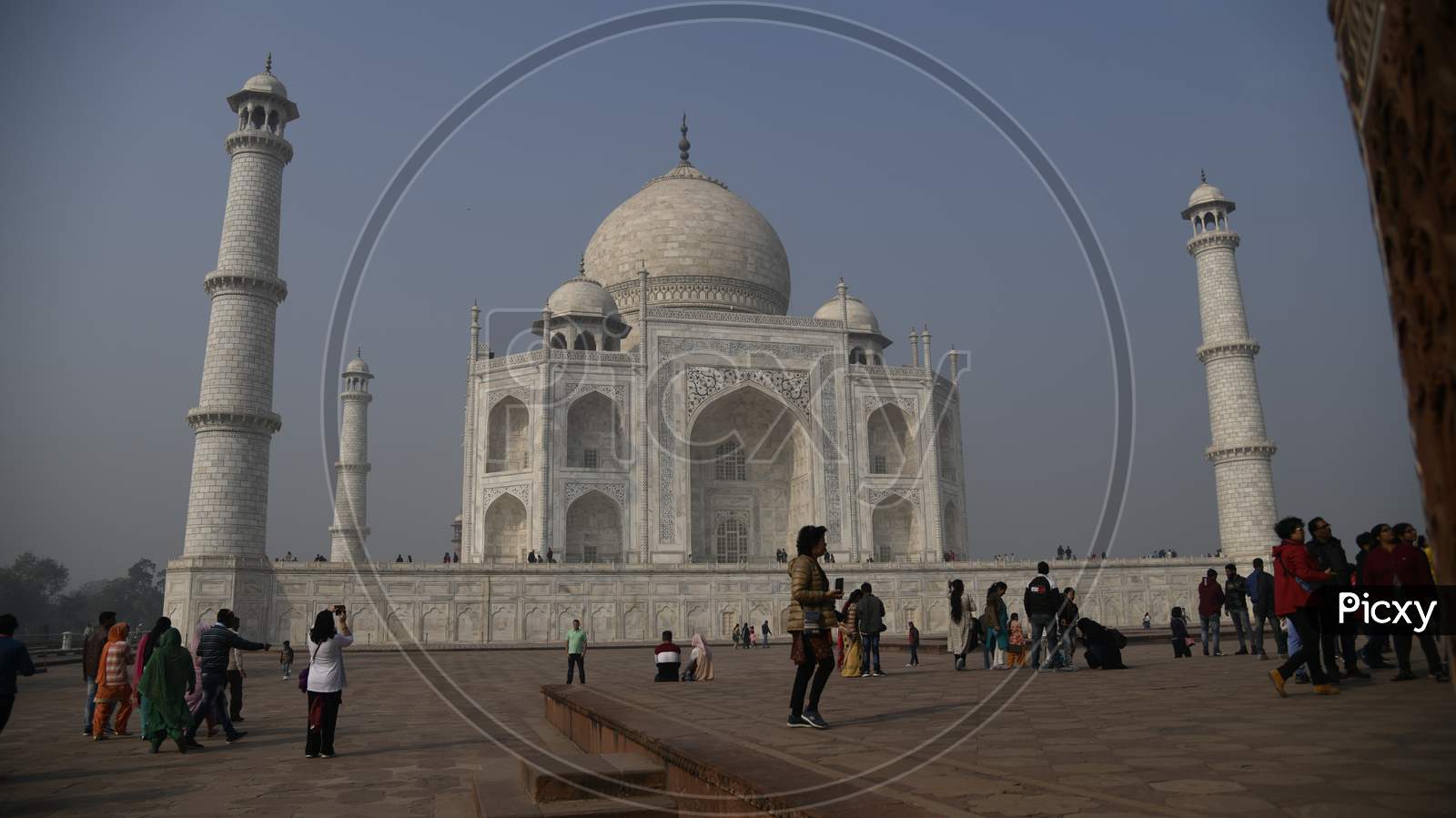 Beautiful View Of Taj Mahal With Visitors