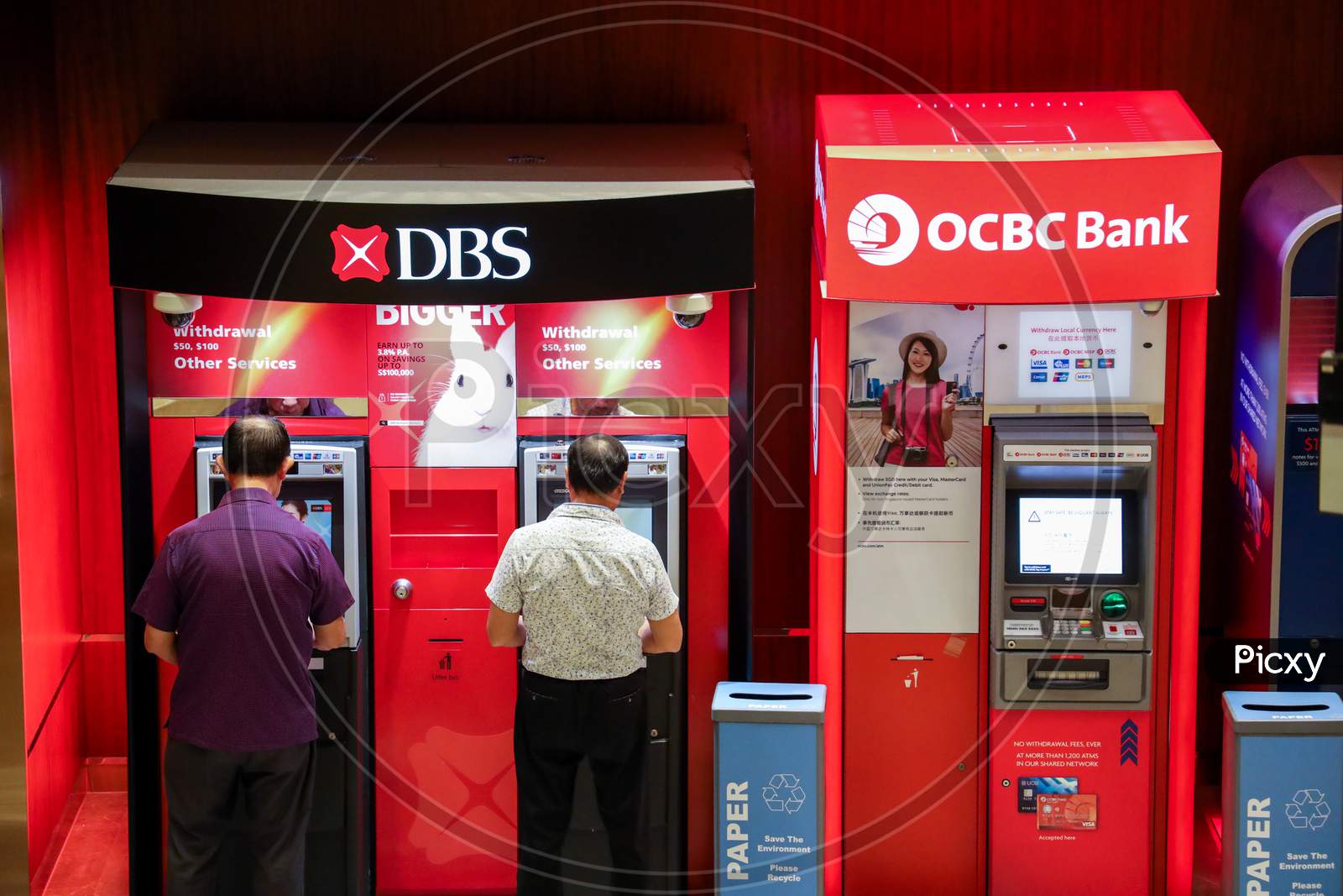 People Using DBS Bank ATM For Cash Withdrawal  in Singapore