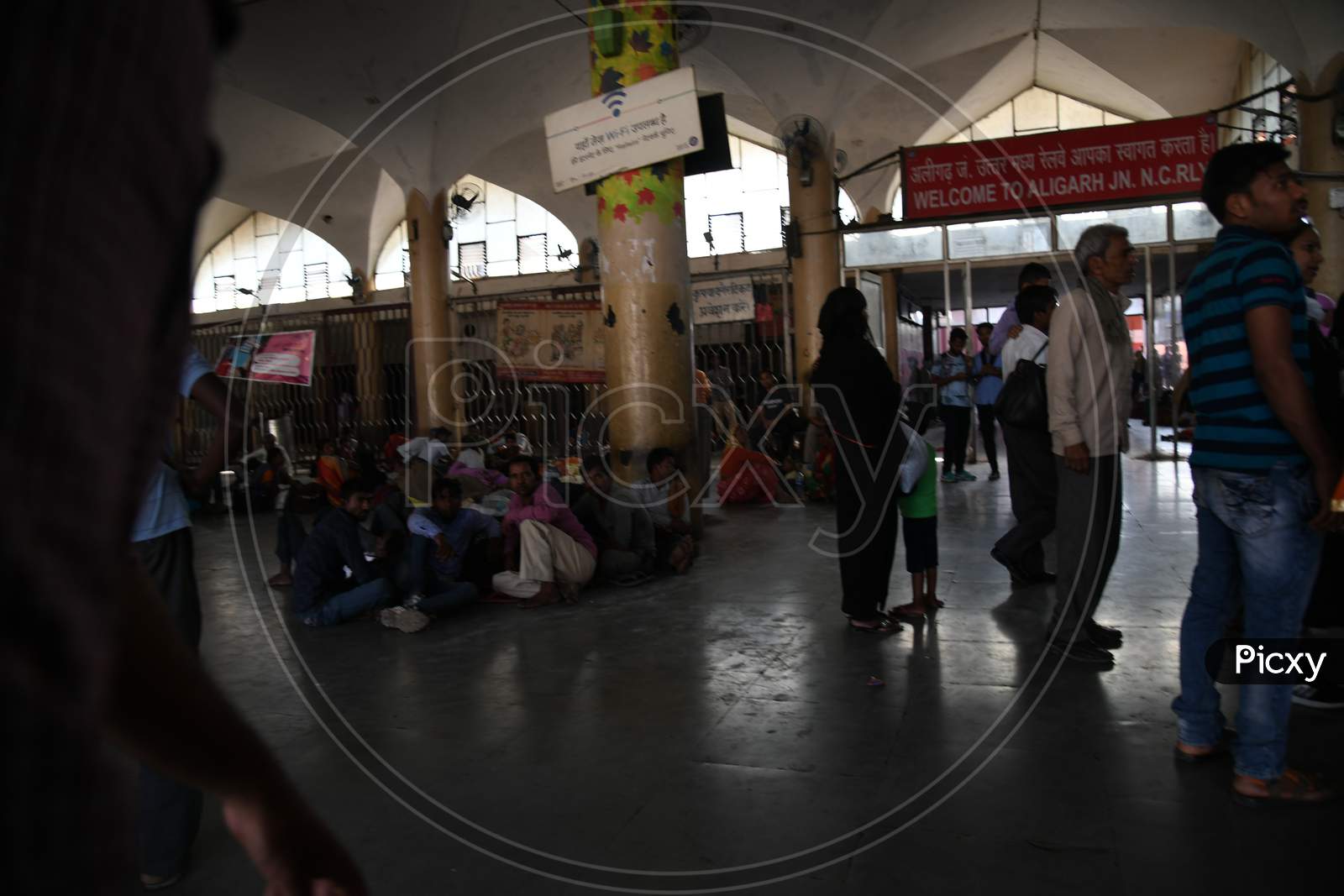 Passengers Waiting On an Railway Station Platform