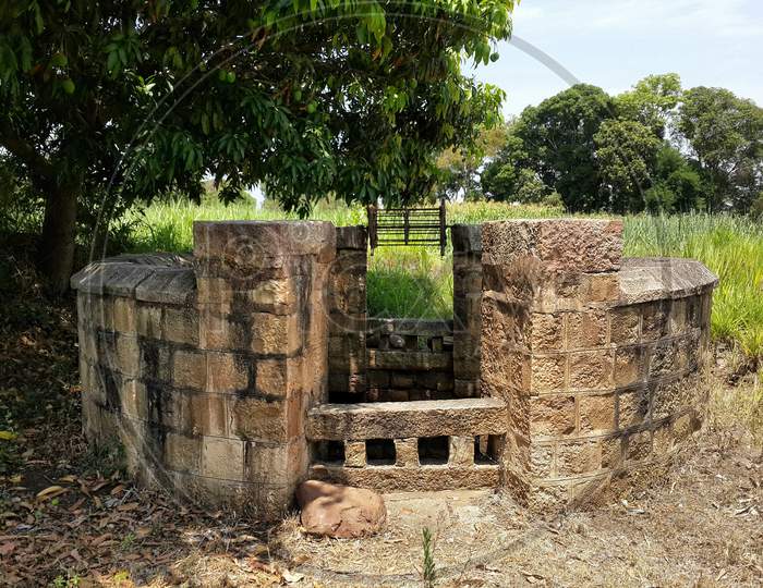 Old stone water well portrait