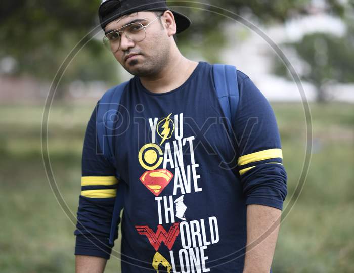 Indian Man wearing t-shirt and cap