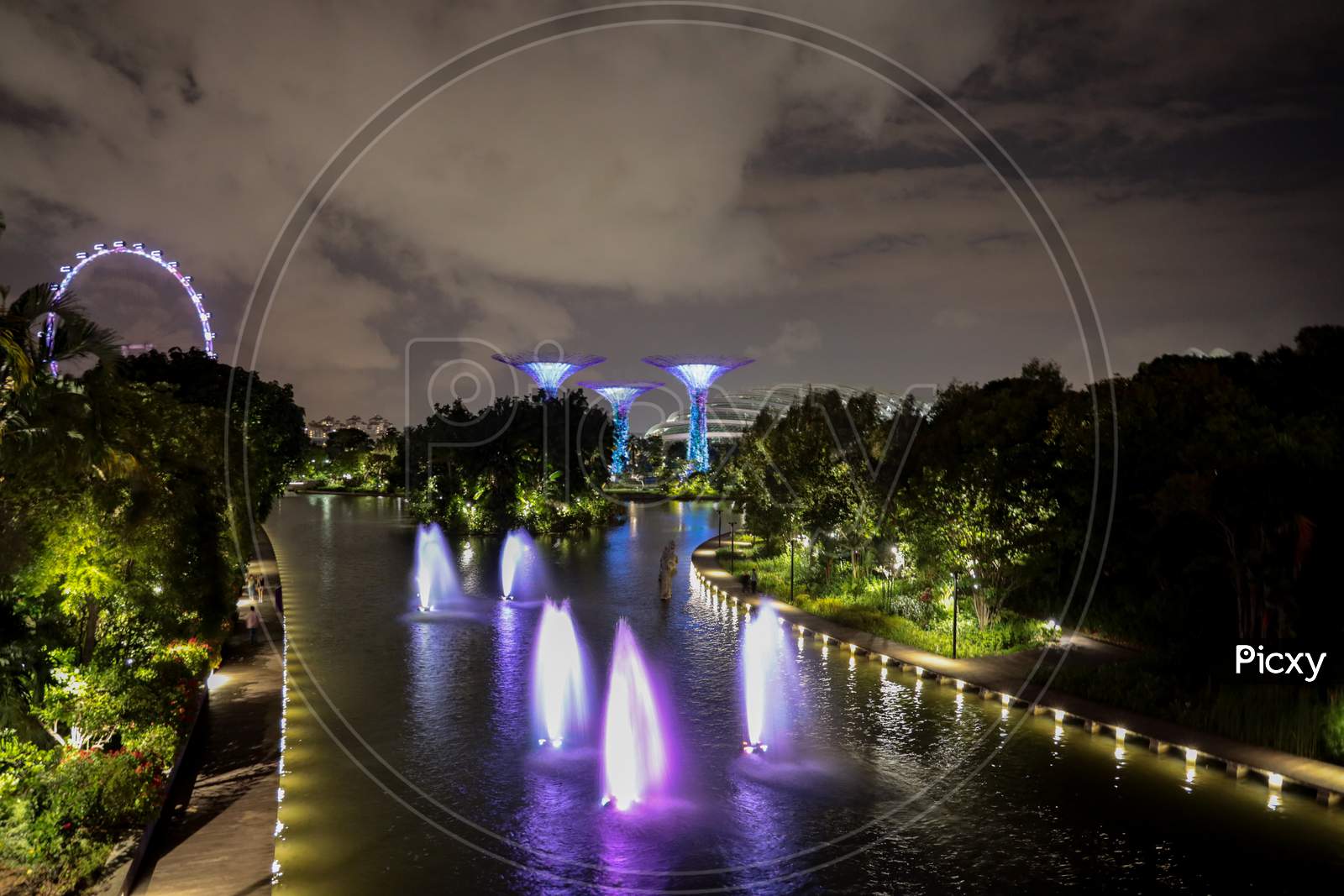 Marina Bay With Neon Lights Fountains In Singapore
