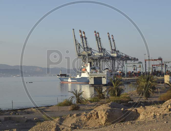 Harbor with shipping containers and cranes in Jordan