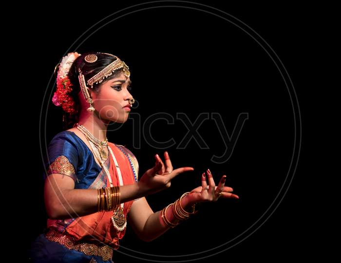 Indian Classical Dancer Performing On Stage