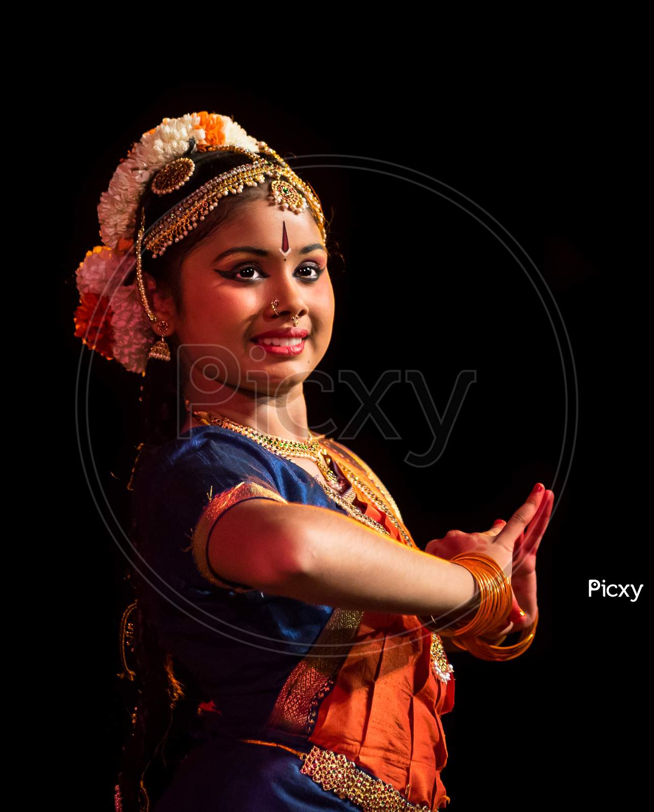 Indian Classical Dancer Performing On Stage