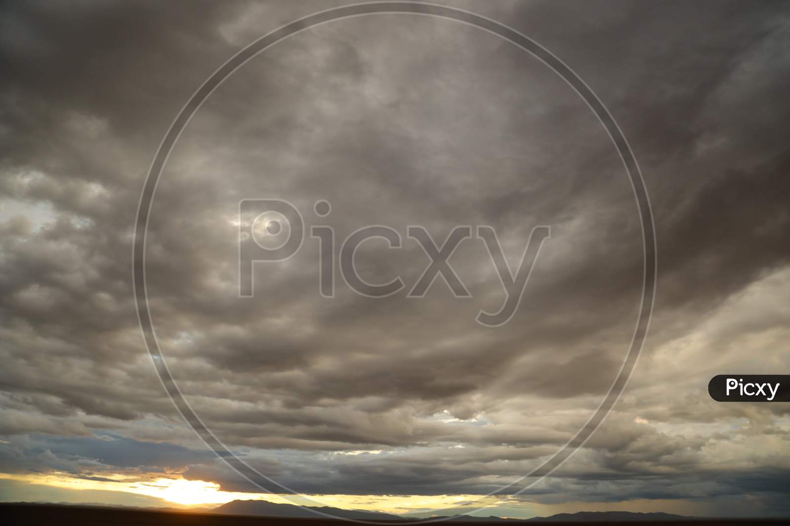 A Dusky Kenya with dark cloudy