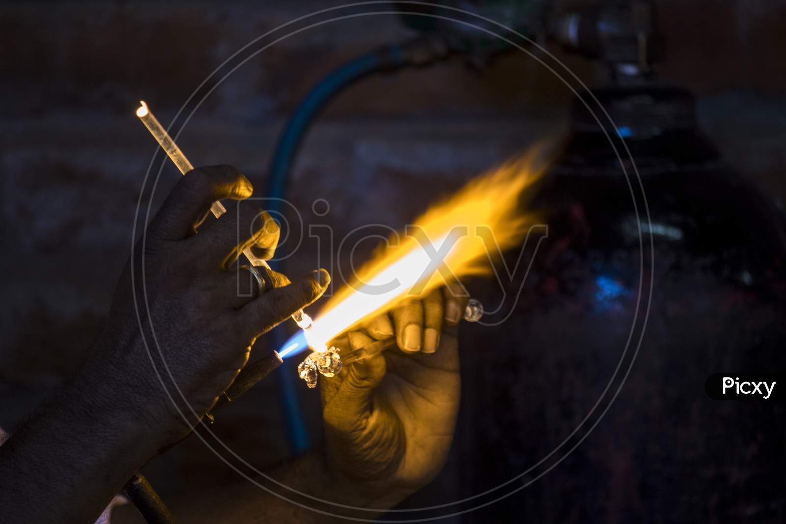 Glass Blowing  With Fire Sparks Cloeup