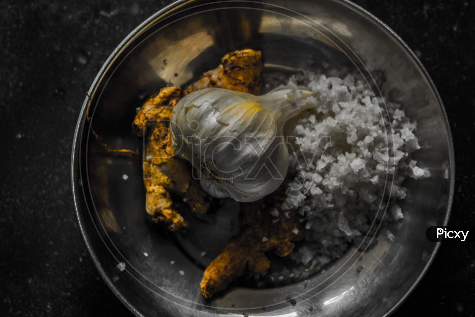 Turmeric , Garlic And  Rock Salt In a Plate