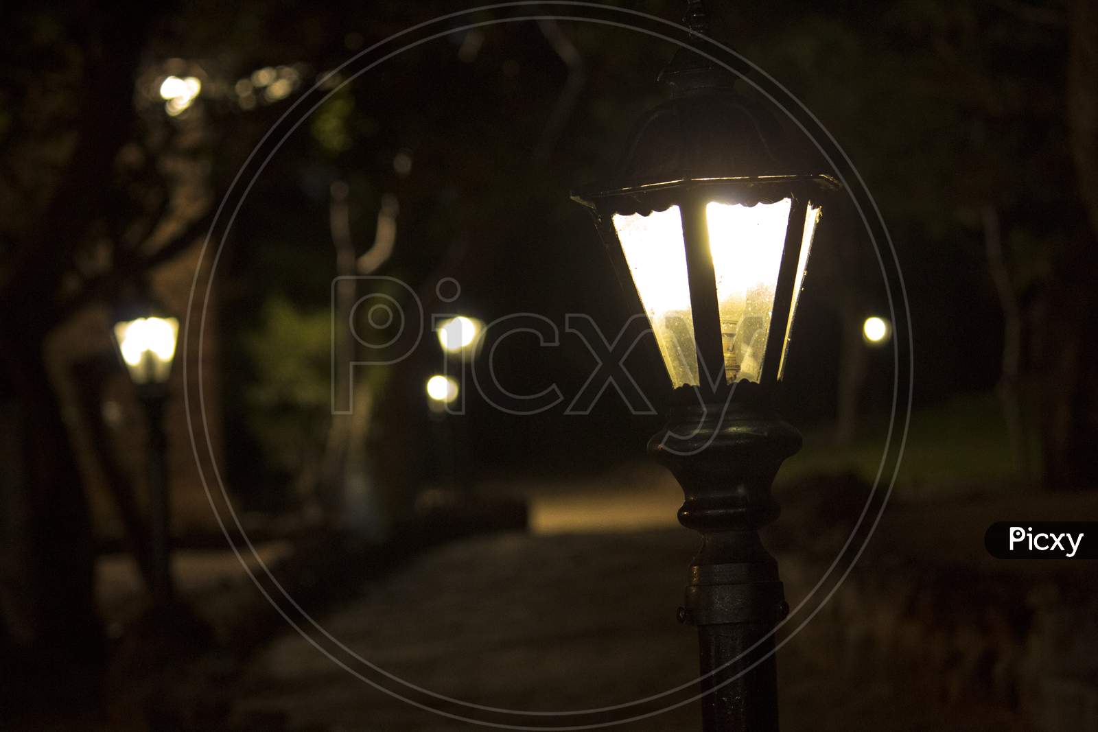 A Lamp Post in an Lane With Night Dark Background