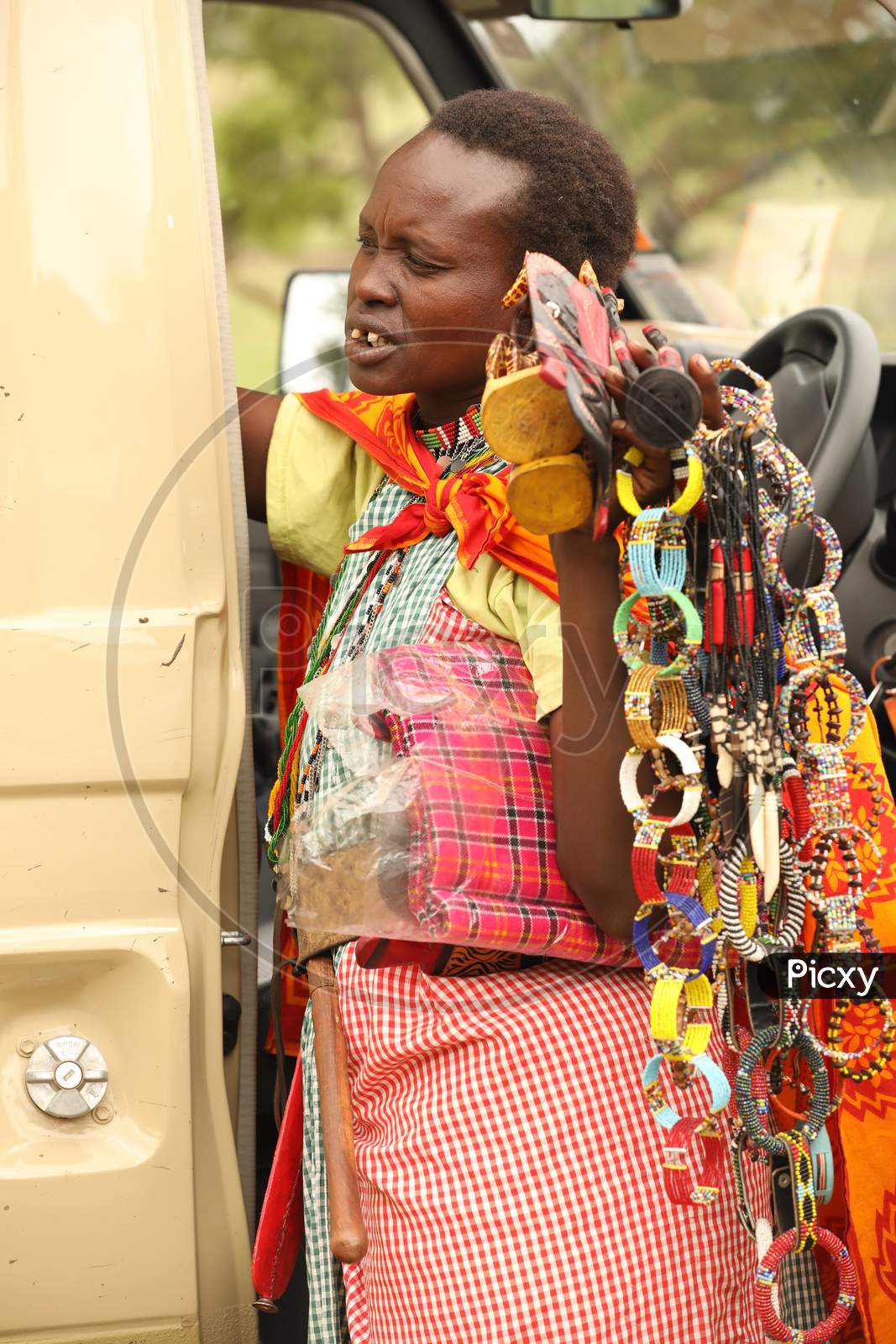 Close up of Tribal woman with handcrafted bracelets