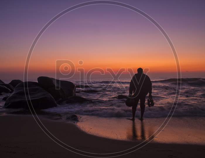 Silhouette Of Man At a Beach