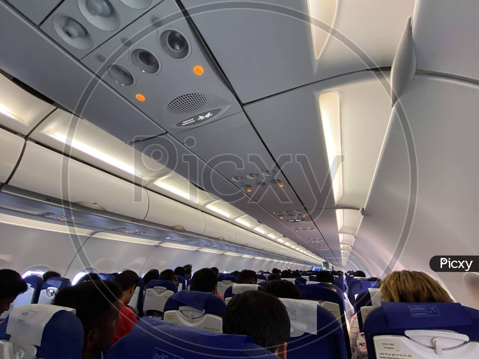 Interior Of an Flight With Passengers On Boarded