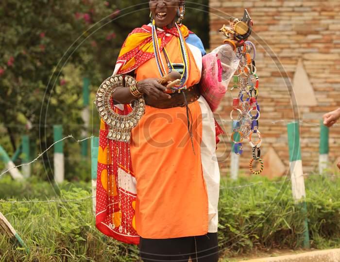 Traditional tribal accessories holding tribal woman