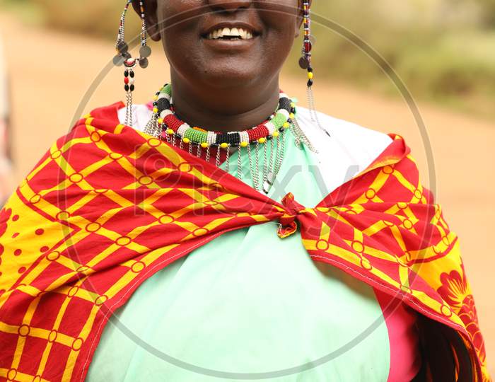 A Nigerian Tribal woman smiling