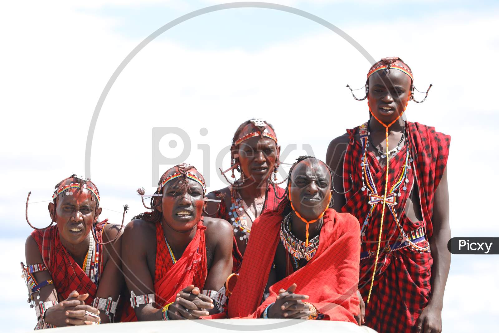 A Group of  Tribal Kenya Men wearing traditional wear