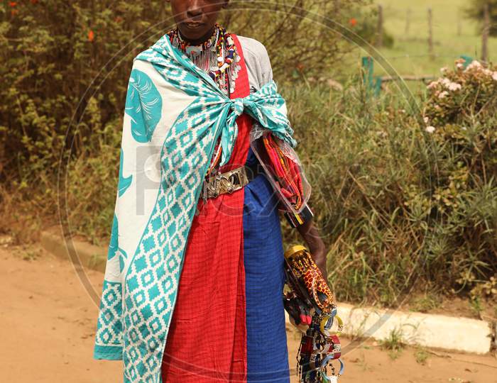 A Nigerian Tribal Woman walking