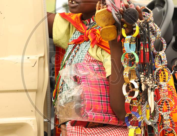 Close up of Tribal woman with handcrafted bracelets