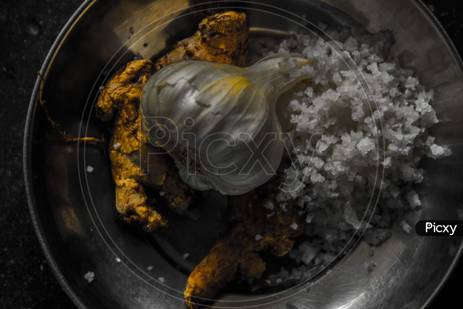 Turmeric , Garlic And  Rock Salt In a Plate