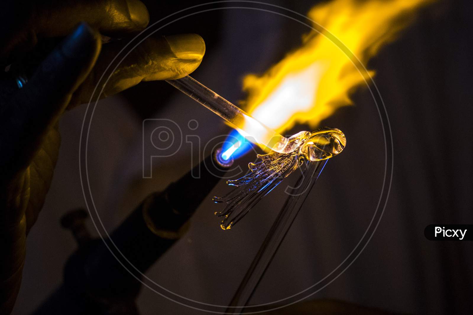 Glass Blowing  With Fire Sparks Cloeup