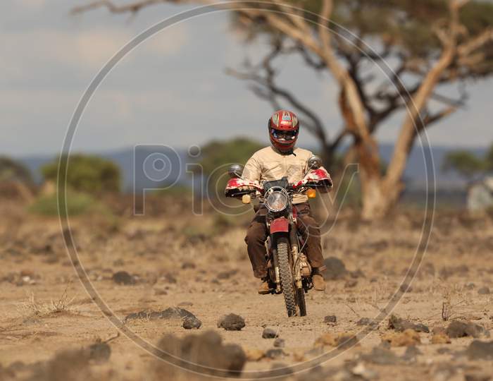 A Biker On Masai Mara National Conservancy